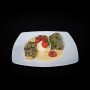 Fisch: Kabeljau in Bärlauchkruste / Rieslingsauce / karamellisierte Tomaten / Parmesan Risotto